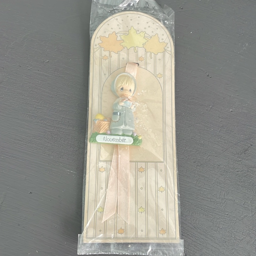 Enesco - Precious Moments pilgrim bookmark for November